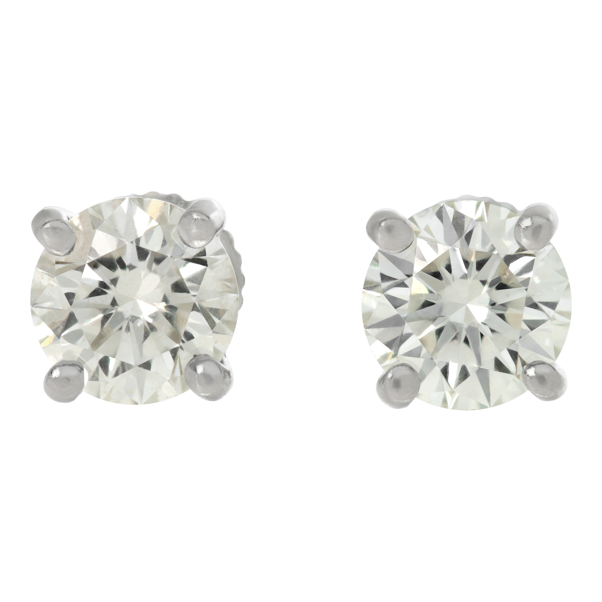 Tiffany & Co. Diamond stud earrings in platinum. 1.02 carats and 1.01 carats G VS1