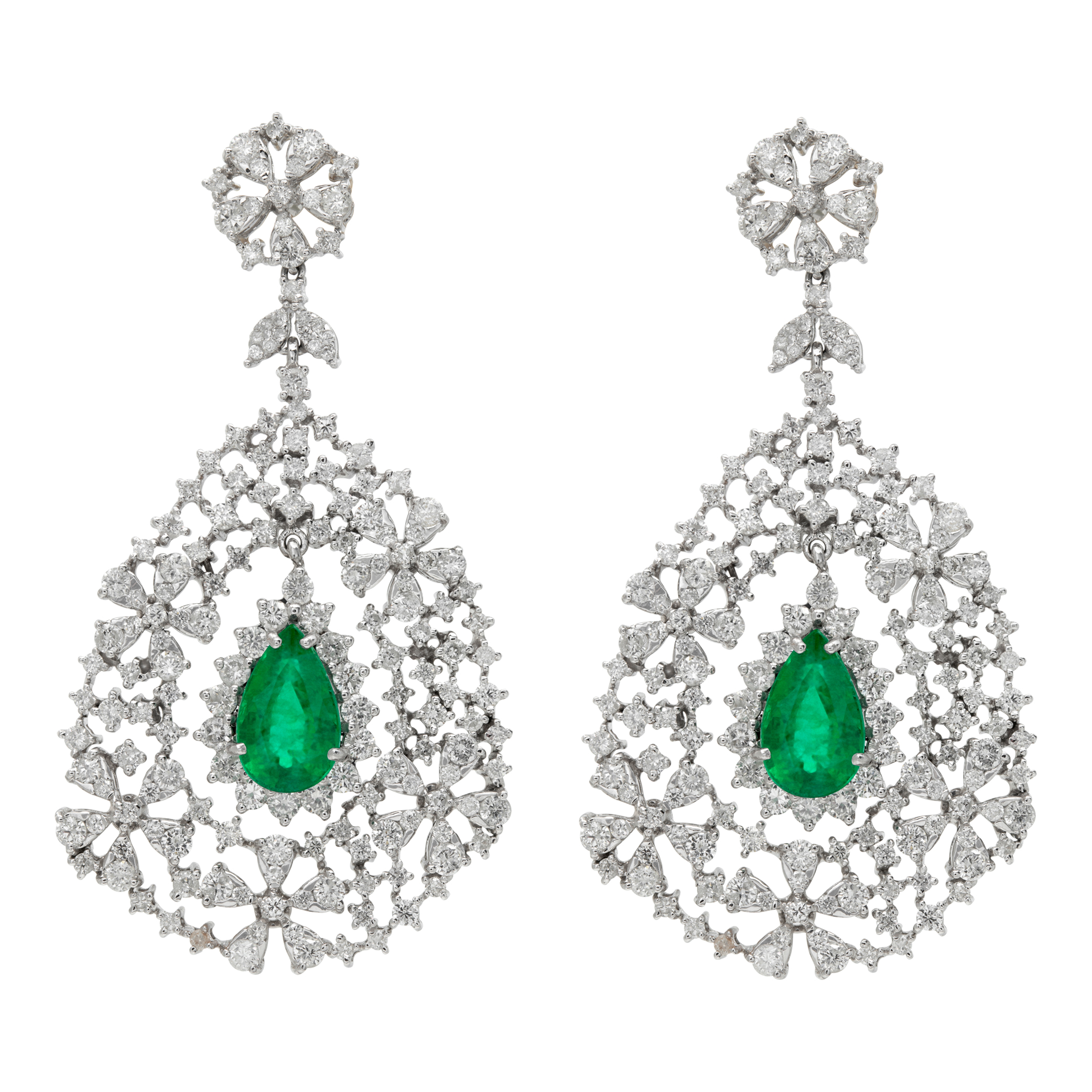 Diamonds and Pear shape Emeralds dangling earrings in 18K white gold. Diamonds approx. weight: 5.00 carats. Emeralds:approx weight: 4 carats