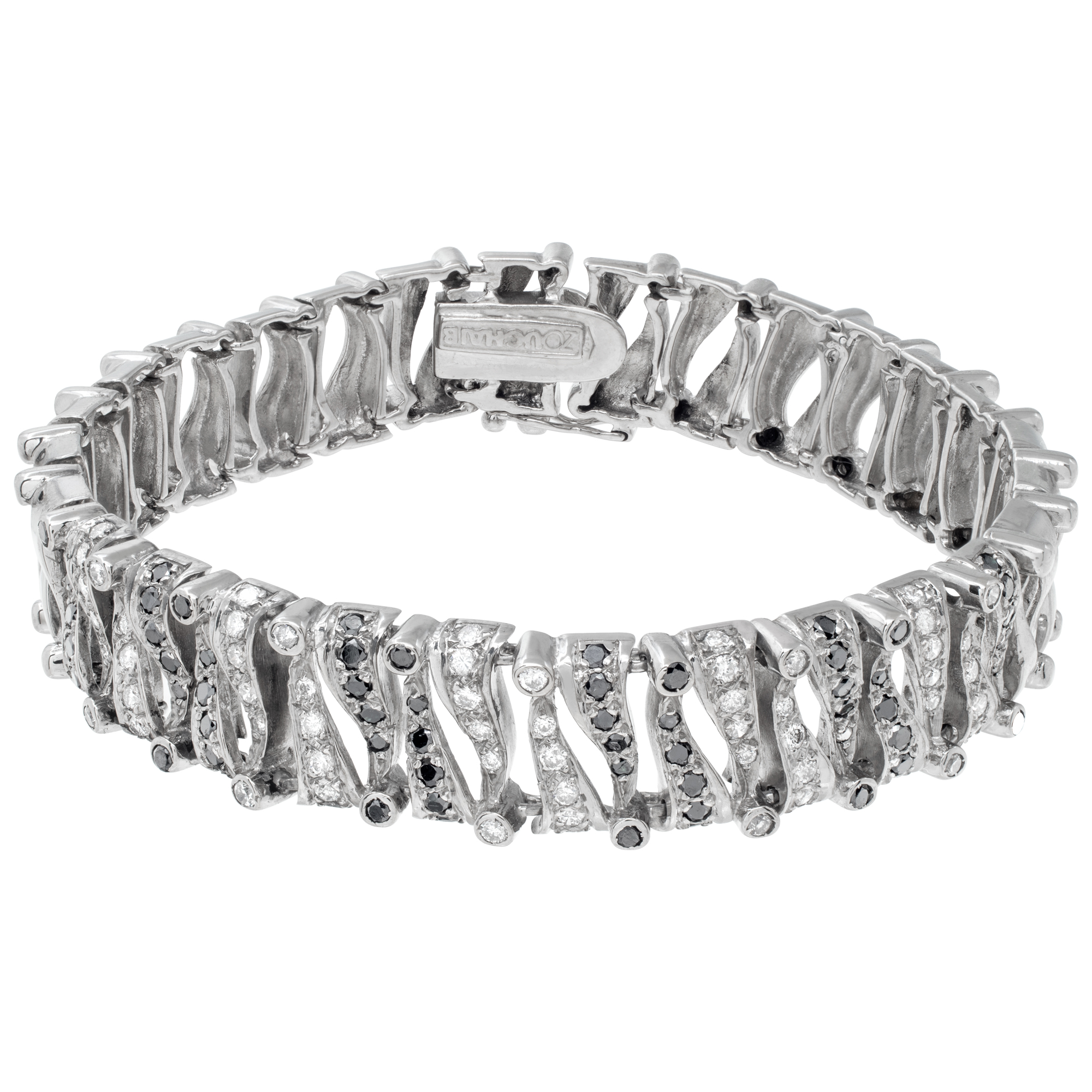 White & black diamond bracelet in 18k white gold, Round brillianr cut diamonds approx: weight: 0.70 carat,