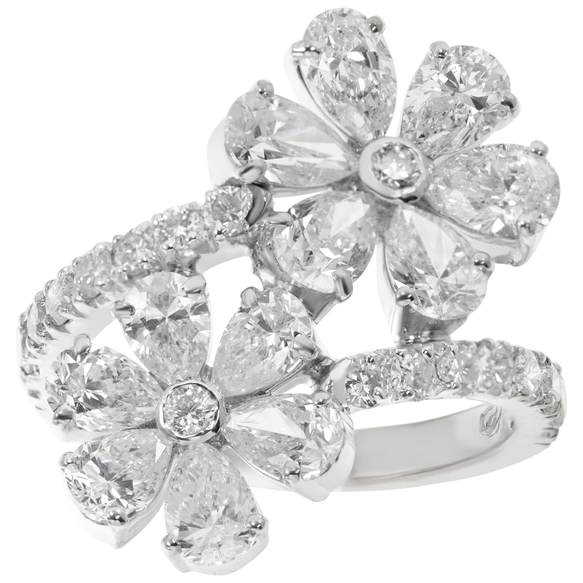 Pear & round brilliant cut diamonds flower ring in 18k white gold. 3.67 carats diamonds.