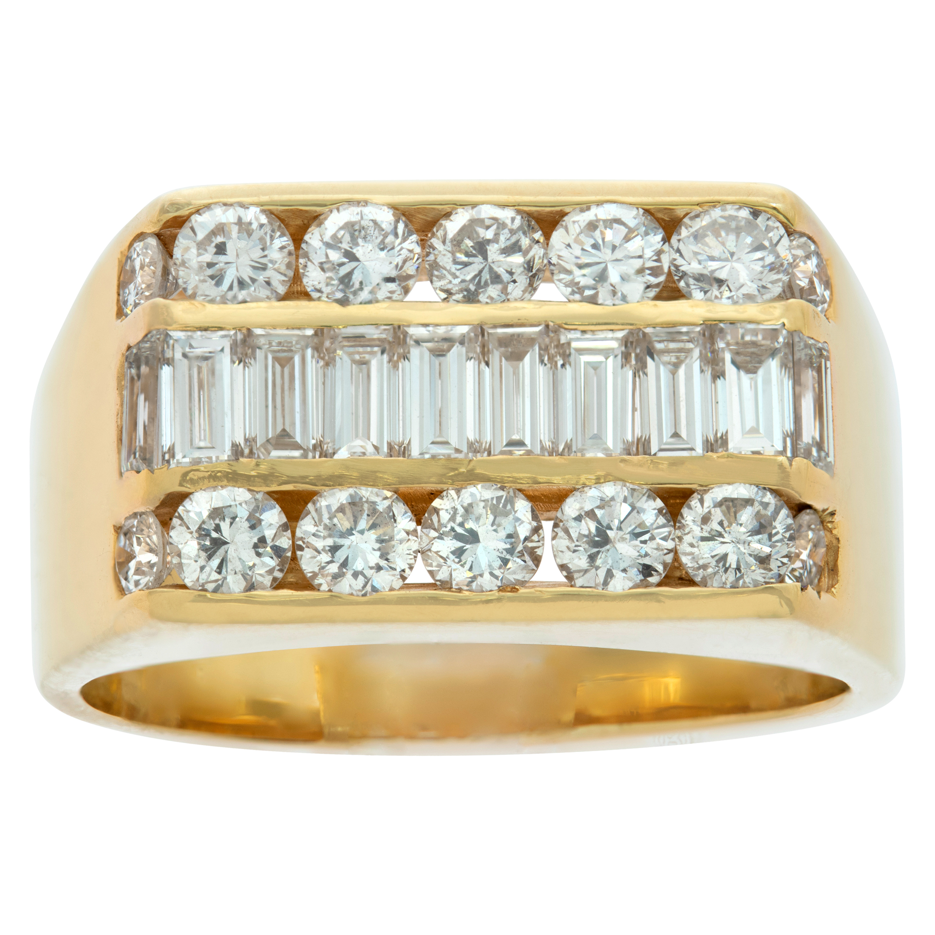 Baguette & round brilliant cut diamonds ring in 14K yellow gold. Baguettes & round brilliant cut diamonds total approx. weight: 3.30 carats