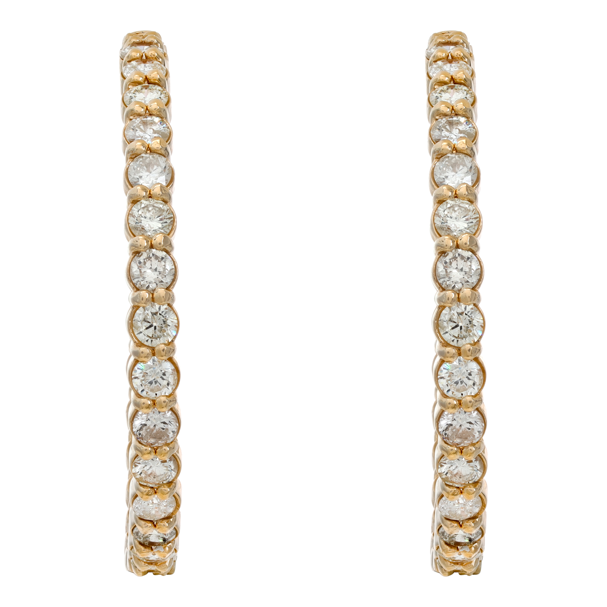 Diamond hoop earrings with approximately 7 carats in diamonds