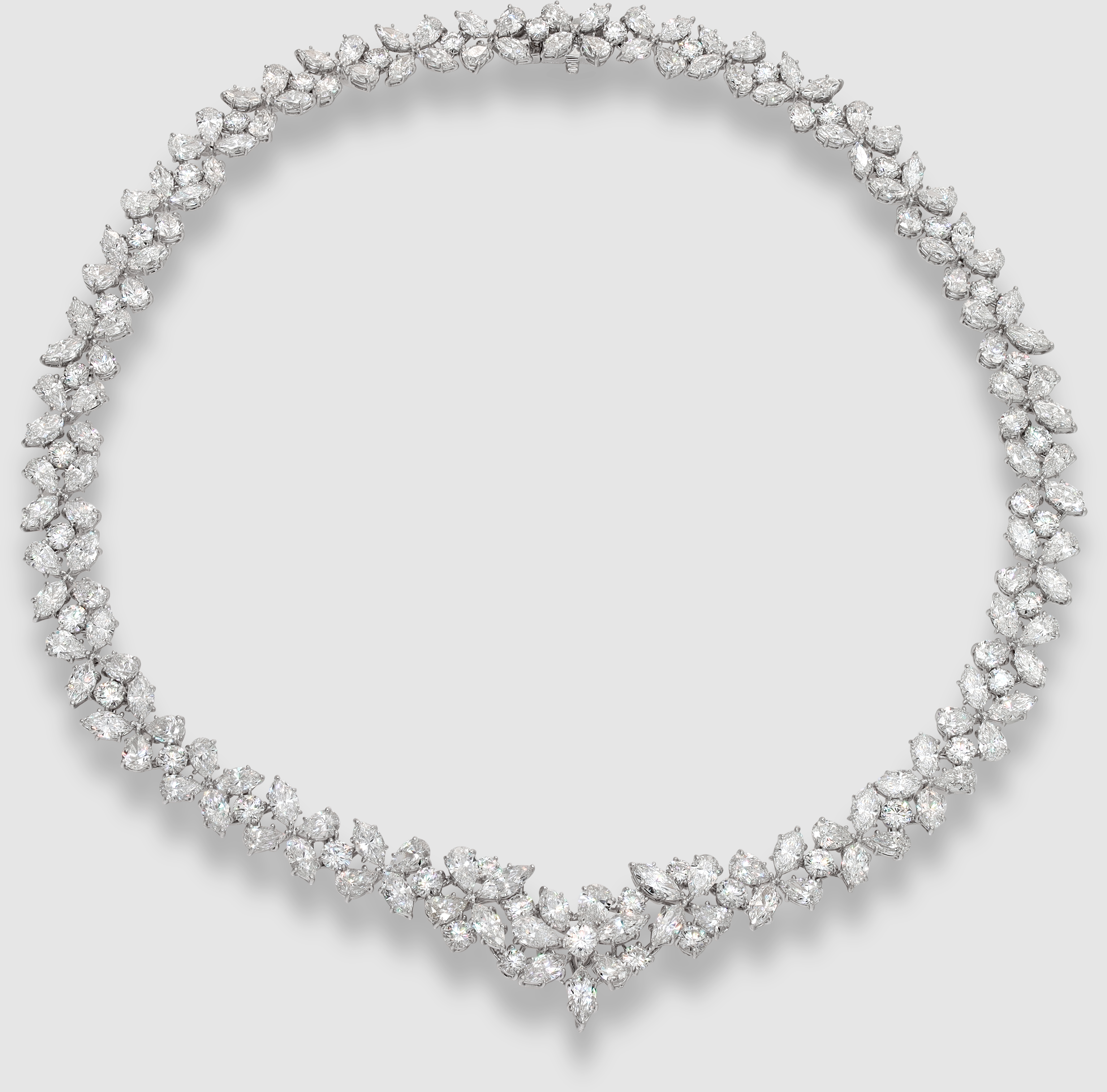Stunning diamond necklace in 18k white gold. Floral mosaic of Marquise, Pear and Round Brilliant cut Diamonds, total approx. weight: 50.00 carats 17.00 inches long.