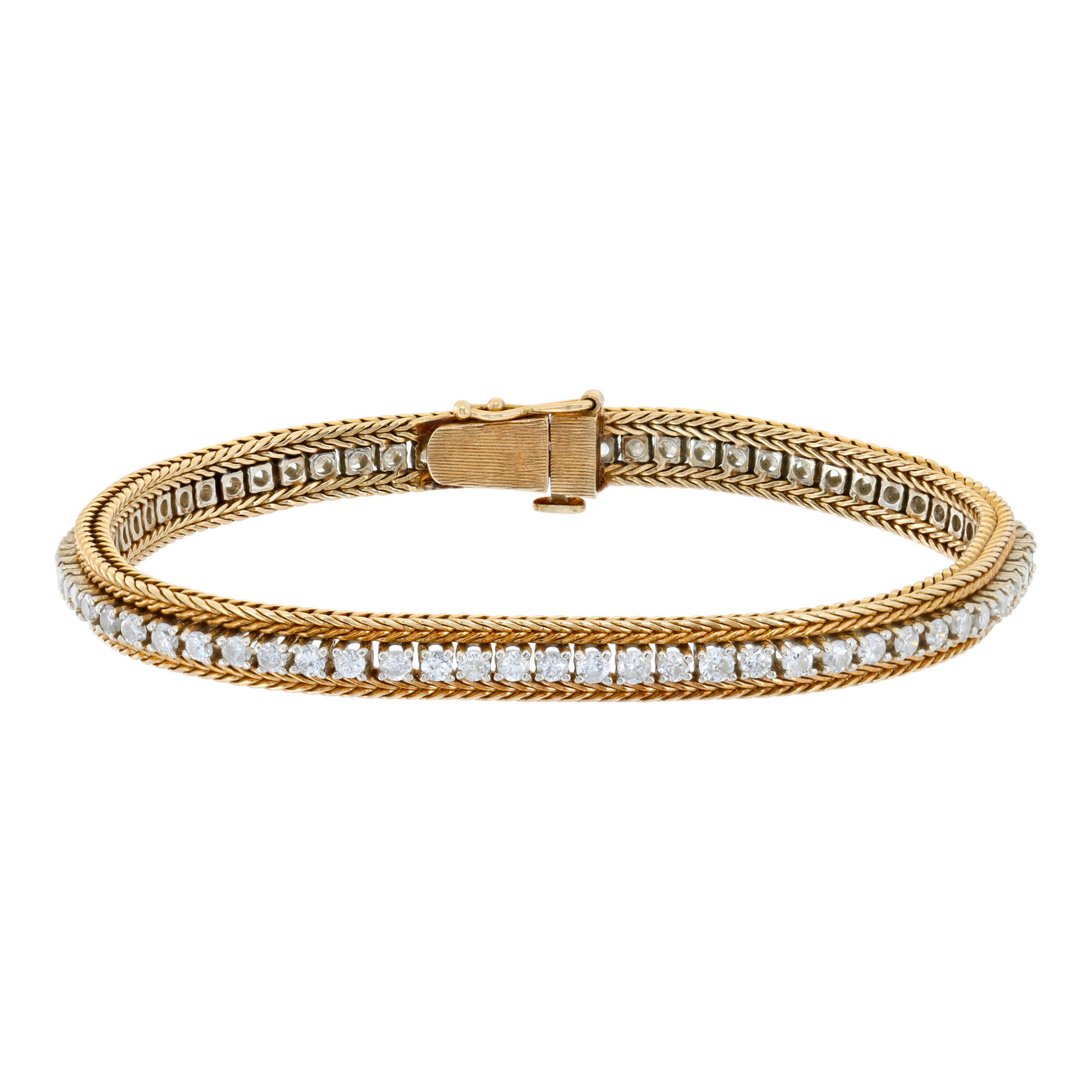 Diamond line bracelet in 14k white & yellow gold with approximately 2.10 carats in round diamonds. (Stones)